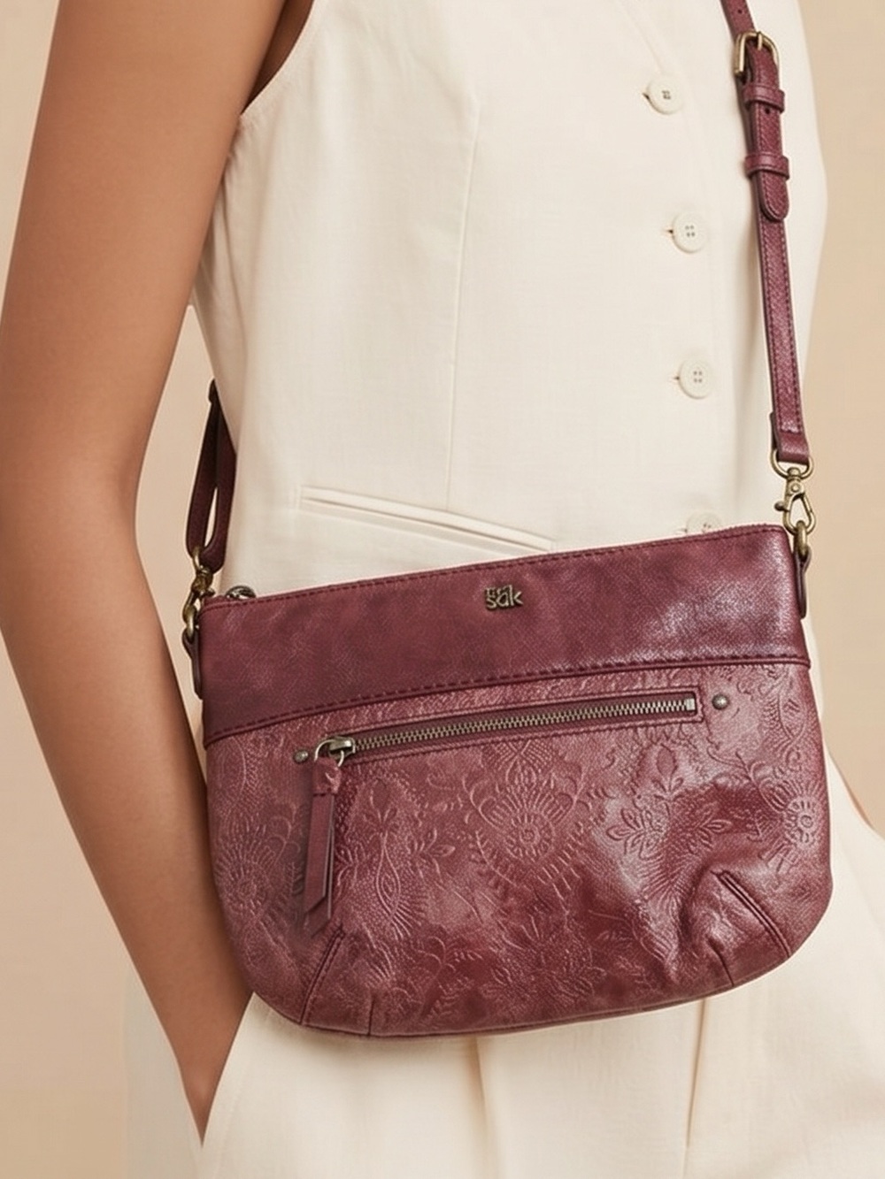 The Sak Embossed Floral Leather Crossbody in Burgundy